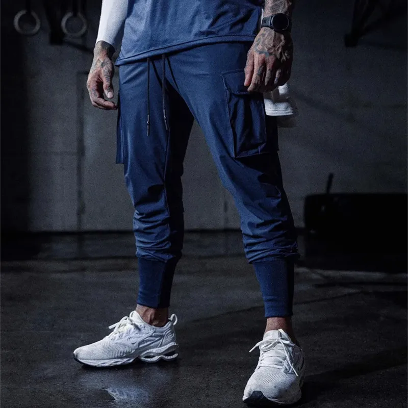 2023 Новые мужские спортивные брюки Фитнес Тонкие свободные быстросохнущие эластичные брюки для бега трусцой Бег на открытом воздухе Тренировочные штаны Мужские спортивные штаны